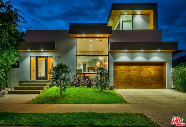 a front view of a house having yard