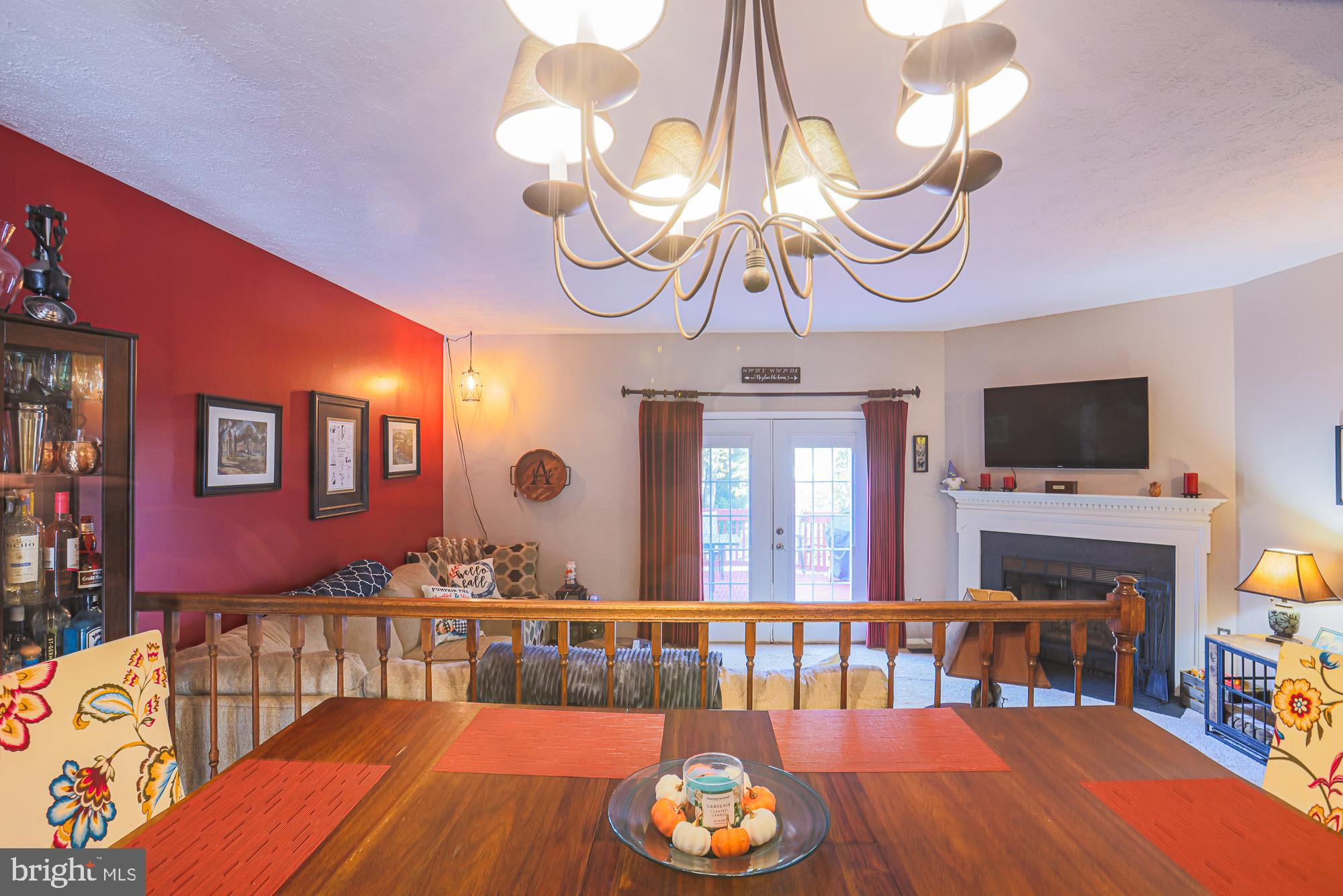 48 Stoneway Place Baltimore, MD 21236 - Photo 11 of 54 Dining overlooking Living Room and Fireplace