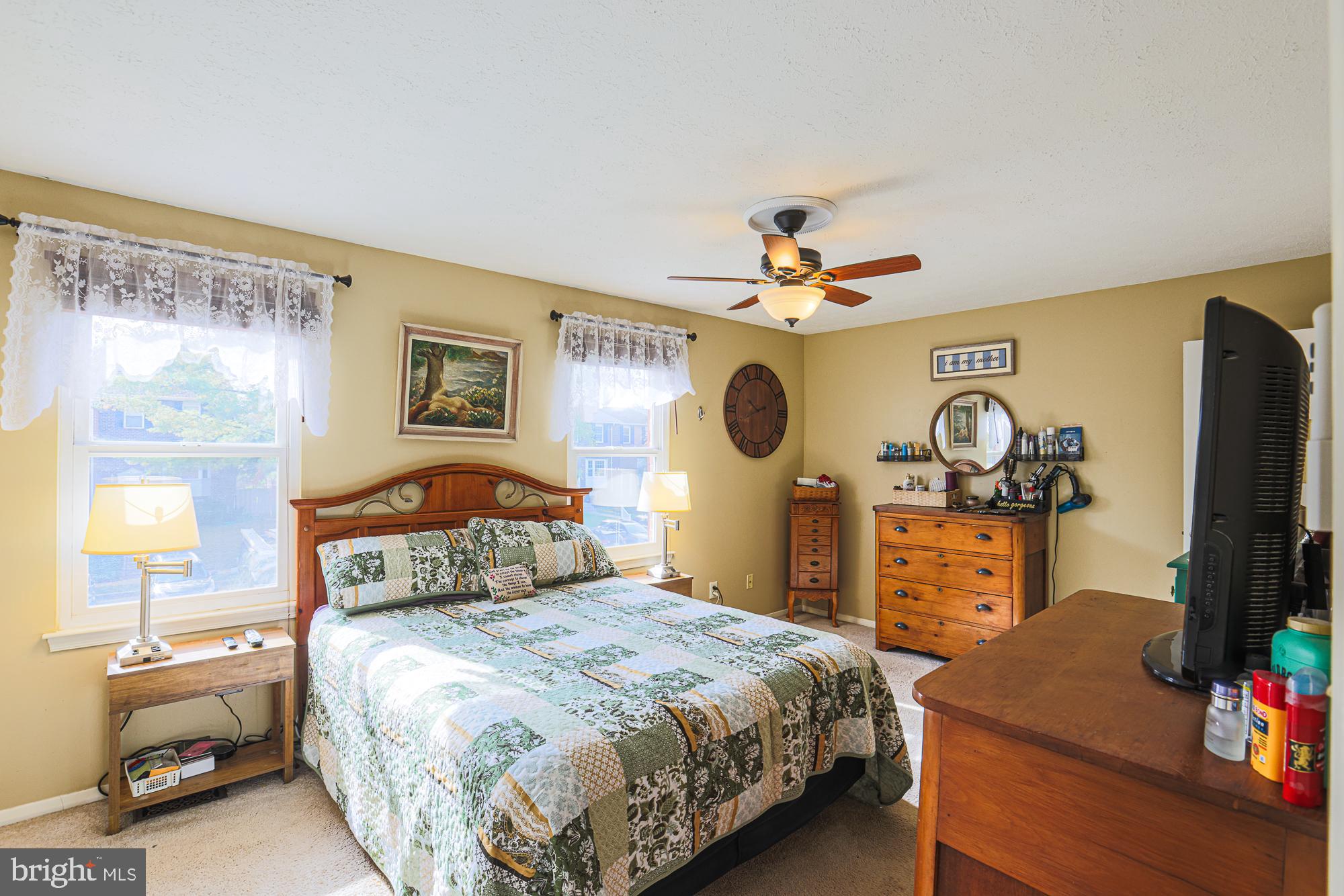 48 Stoneway Place Baltimore, MD 21236 - Photo 25 of 54 Primary Bedroom w/ ceiling fan + ensuite bathroom
