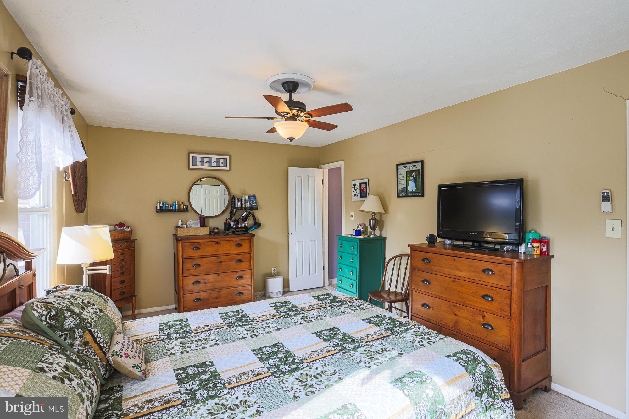 48 Stoneway Place Baltimore, MD 21236 - Photo 26 of 54 Primary Bedroom w/ ceiling fan + ensuite bathroom