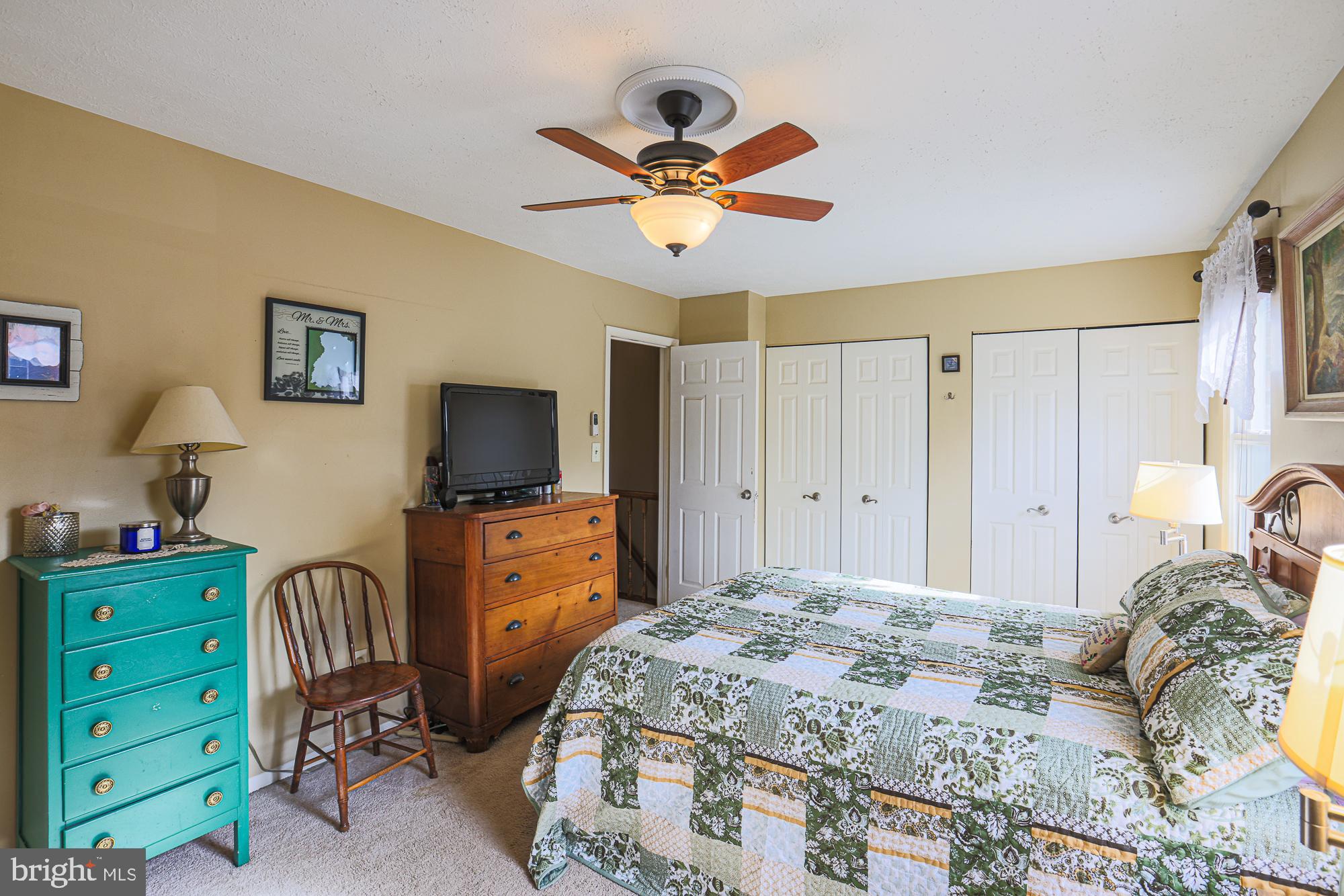 48 Stoneway Place Baltimore, MD 21236 - Photo 27 of 54 Primary Bedroom w/ ceiling fan + ensuite bathroom