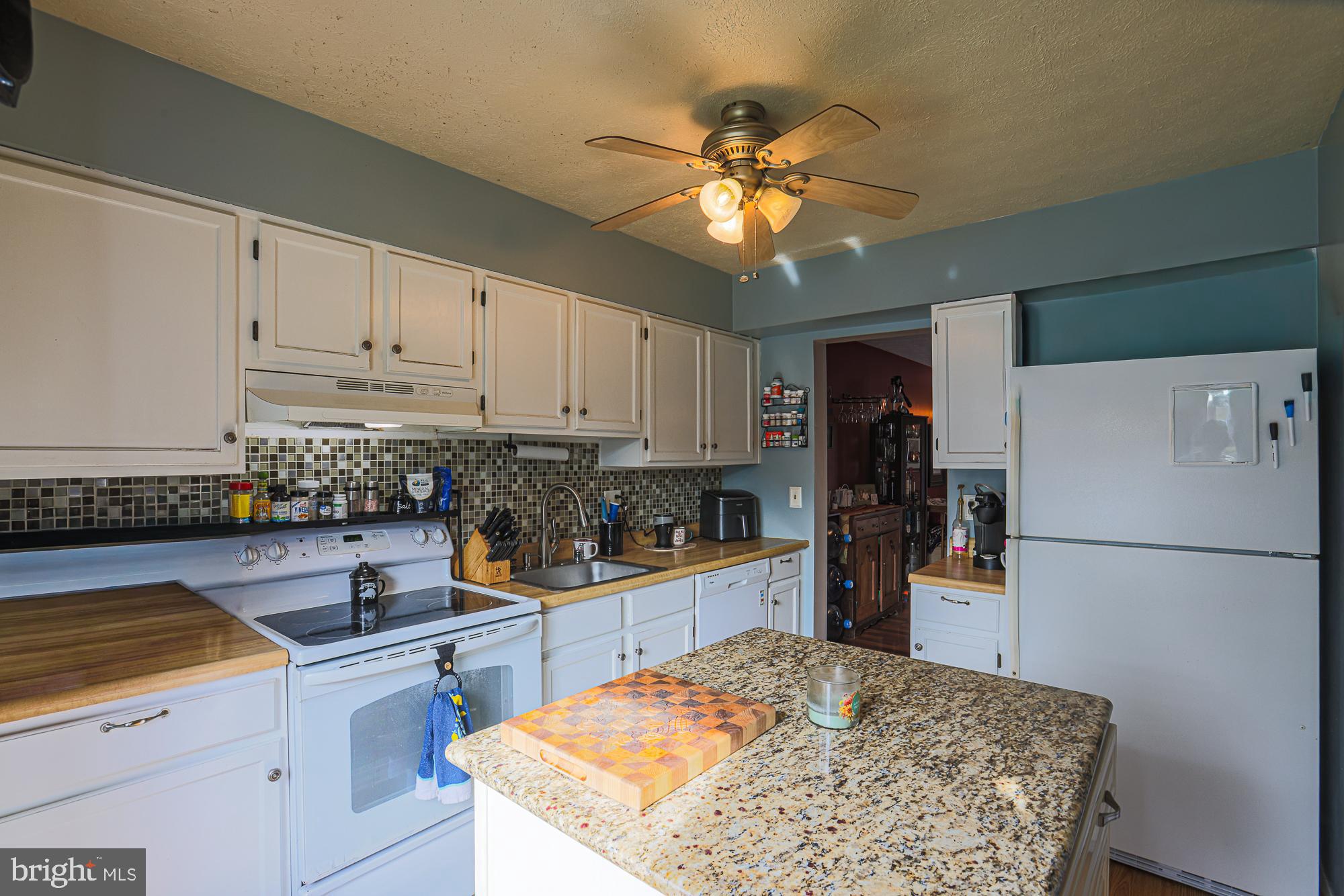 48 Stoneway Place Baltimore, MD 21236 - Photo 6 of 54 Kitchen with island and ceiling fan
