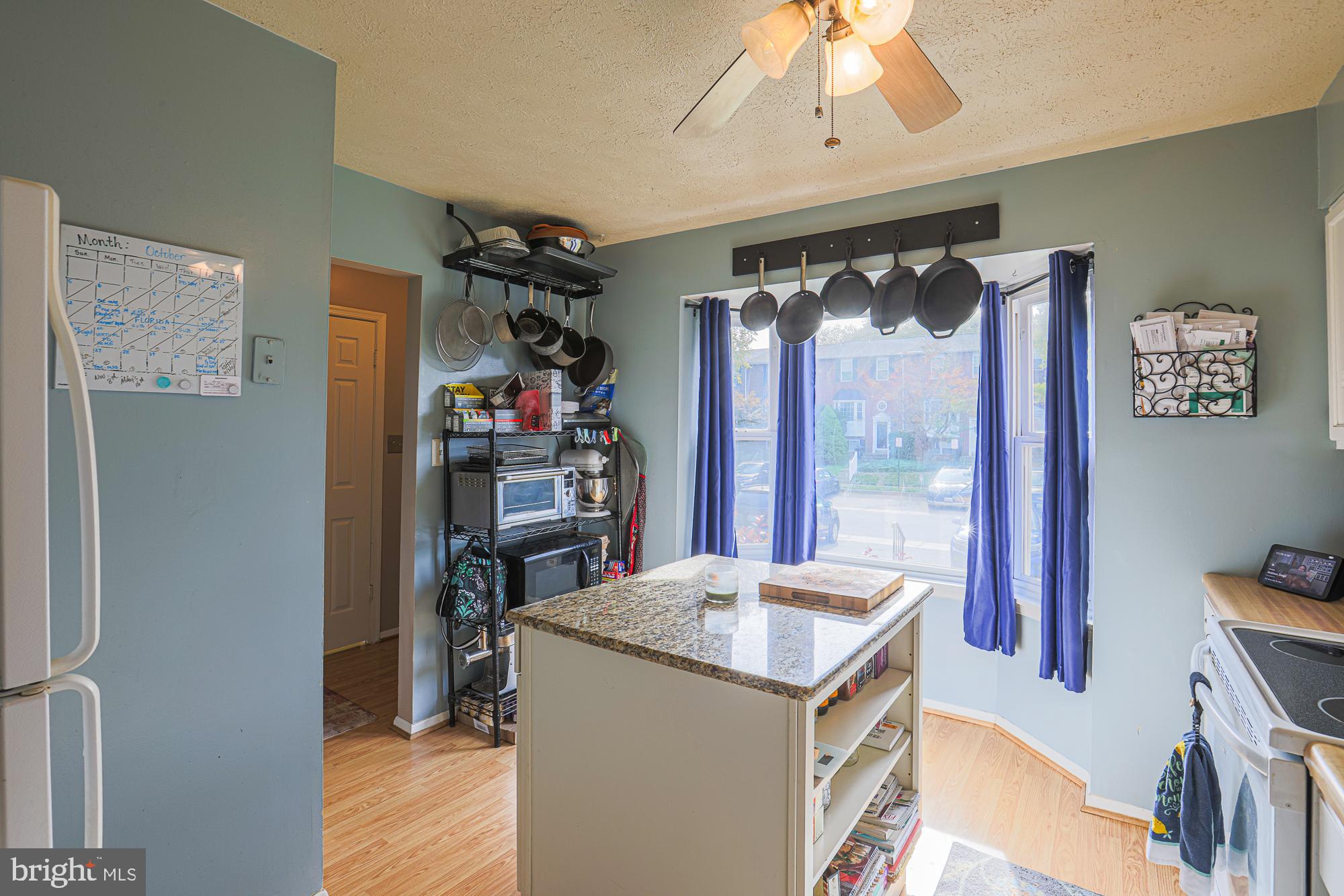 48 Stoneway Place Baltimore, MD 21236 - Photo 8 of 54 Kitchen with island and ceiling fan