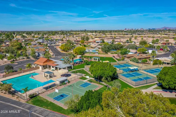 a view of a city with lawn chairs