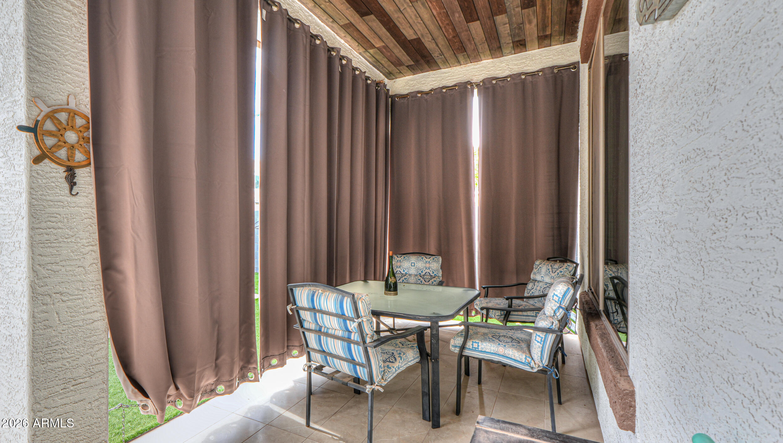 45247 West Jack Rabbit Trail Maricopa, AZ 85139 - Photo 59 of 75 a dining room with furniture and window