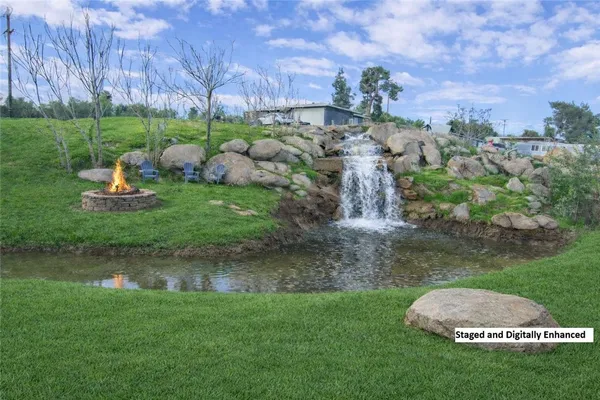 a backyard of a house with lots of green space