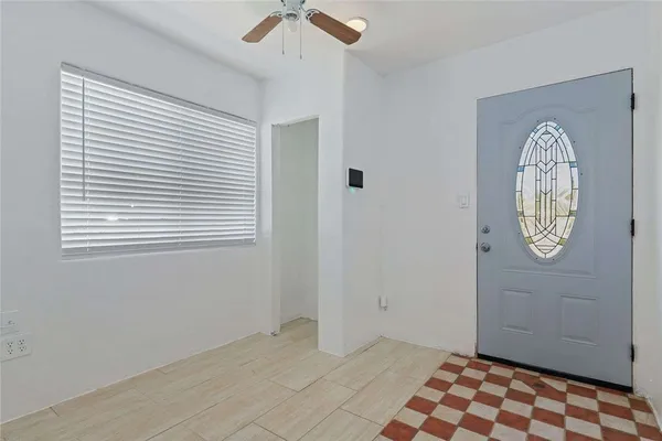 a view of a hallway with entryway