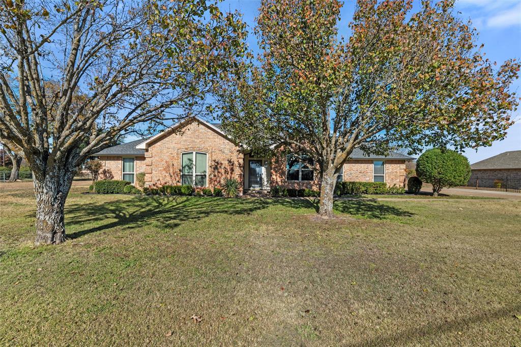 517 Hiwasee Road Waxahachie, TX 75165 - Photo 1 of 38 a front view of a house with a yard