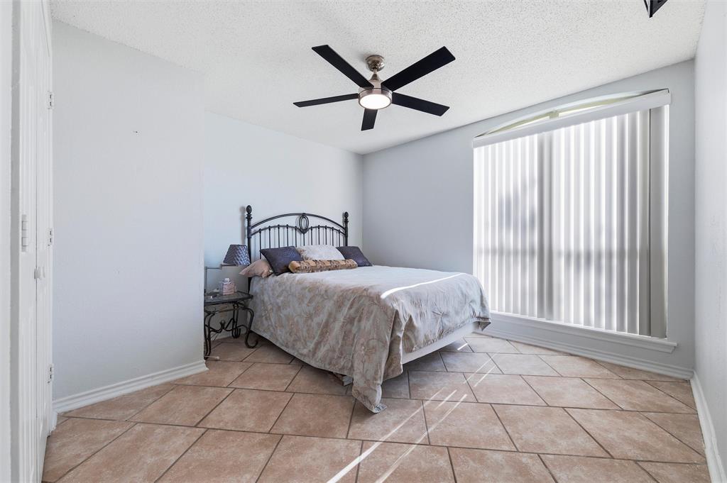 517 Hiwasee Road Waxahachie, TX 75165 - Photo 20 of 38 a bedroom with a bed and window