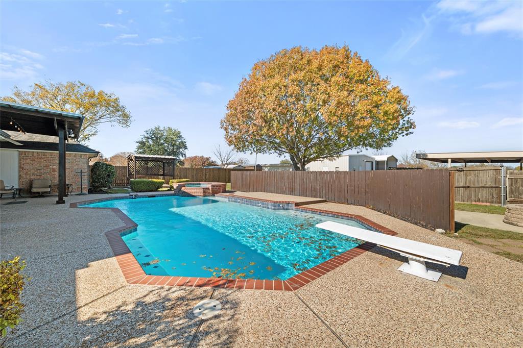 517 Hiwasee Road Waxahachie, TX 75165 - Photo 27 of 38 a view of a backyard with swimming pool