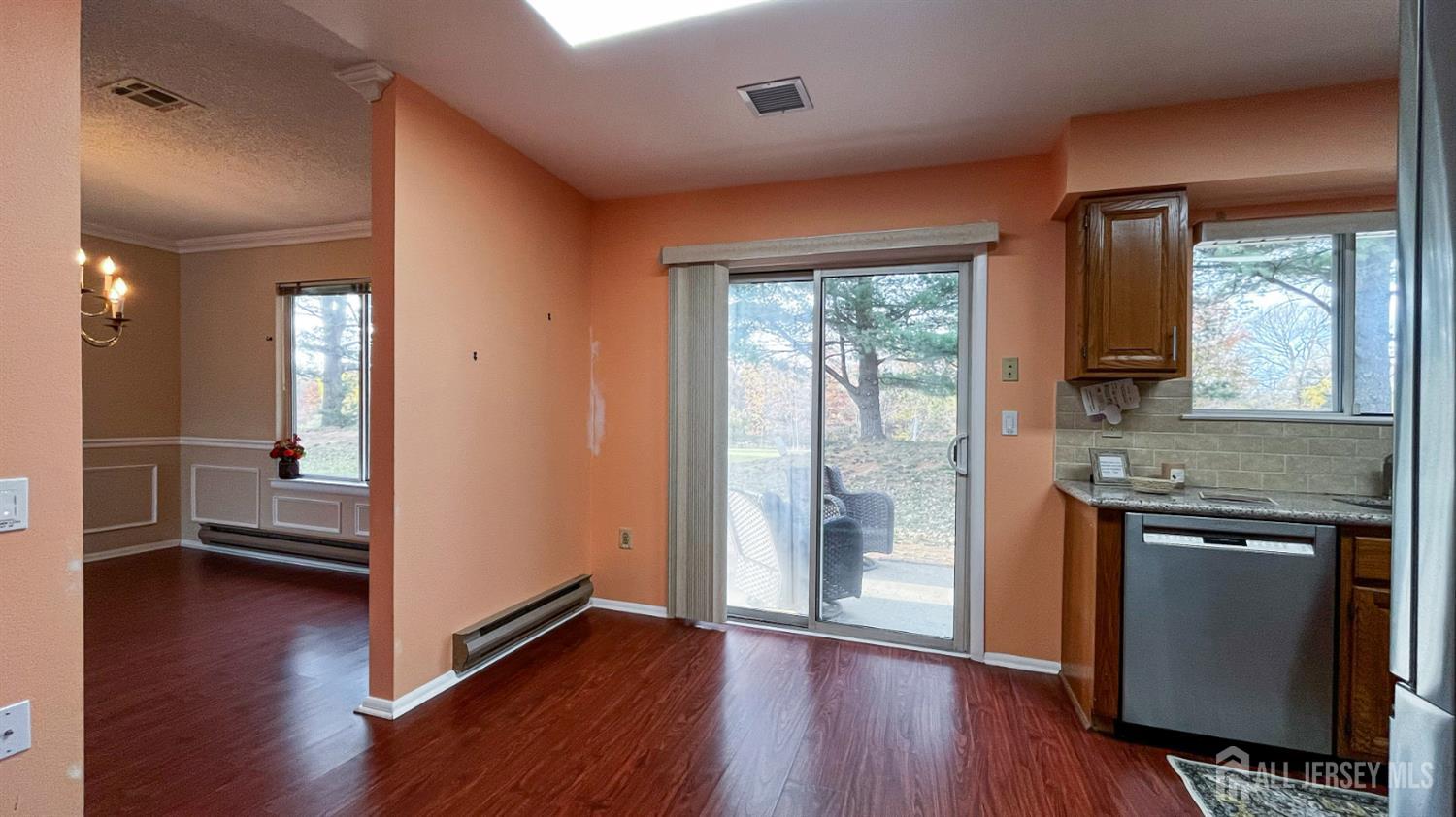 719 Delair Road, Unit B Monroe Township, NJ 08831 - Photo 11 of 21 wooden floor in an empty room with a window and wooden floor