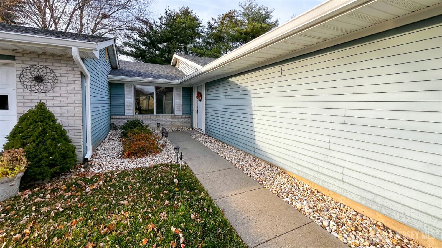 719 Delair Road, Unit B Monroe Township, NJ 08831 - Photo 18 of 21 a front view of a house with garden