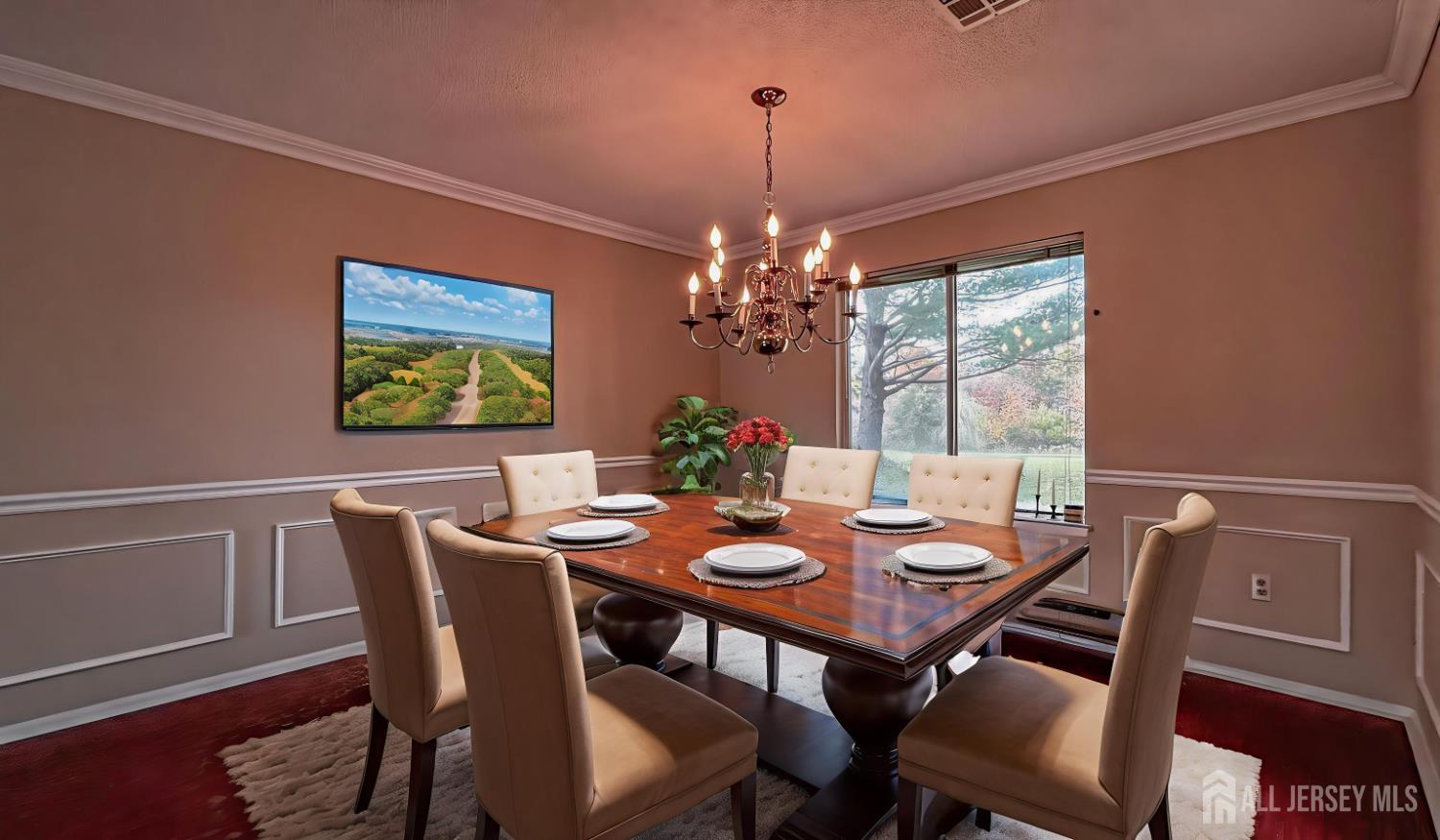 719 Delair Road, Unit B Monroe Township, NJ 08831 - Photo 20 of 21 a view of a dining room with furniture a chandelier and wooden floor