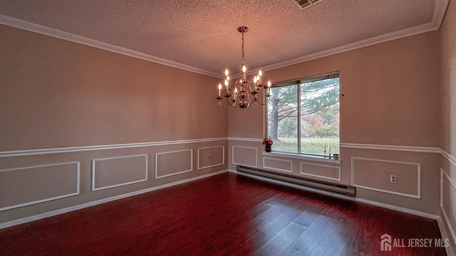 719 Delair Road, Unit B Monroe Township, NJ 08831 - Photo 7 of 21 a view of room with window and wooden floor