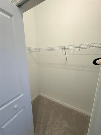 a view of small space with racks on the wall