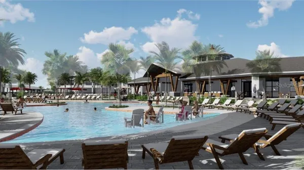 a view of a swimming pool and sitting area