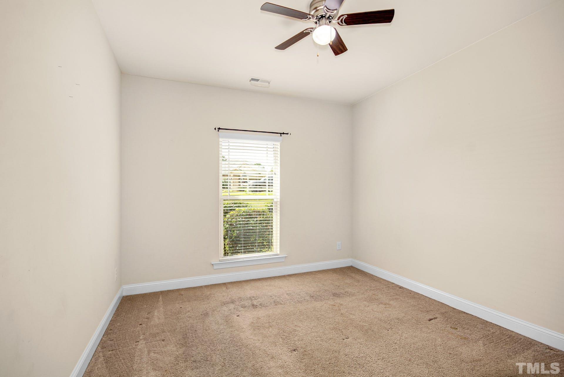 44 Destiny Circle Angier, NC 27501 - Photo 24 of 35 an empty room with a window