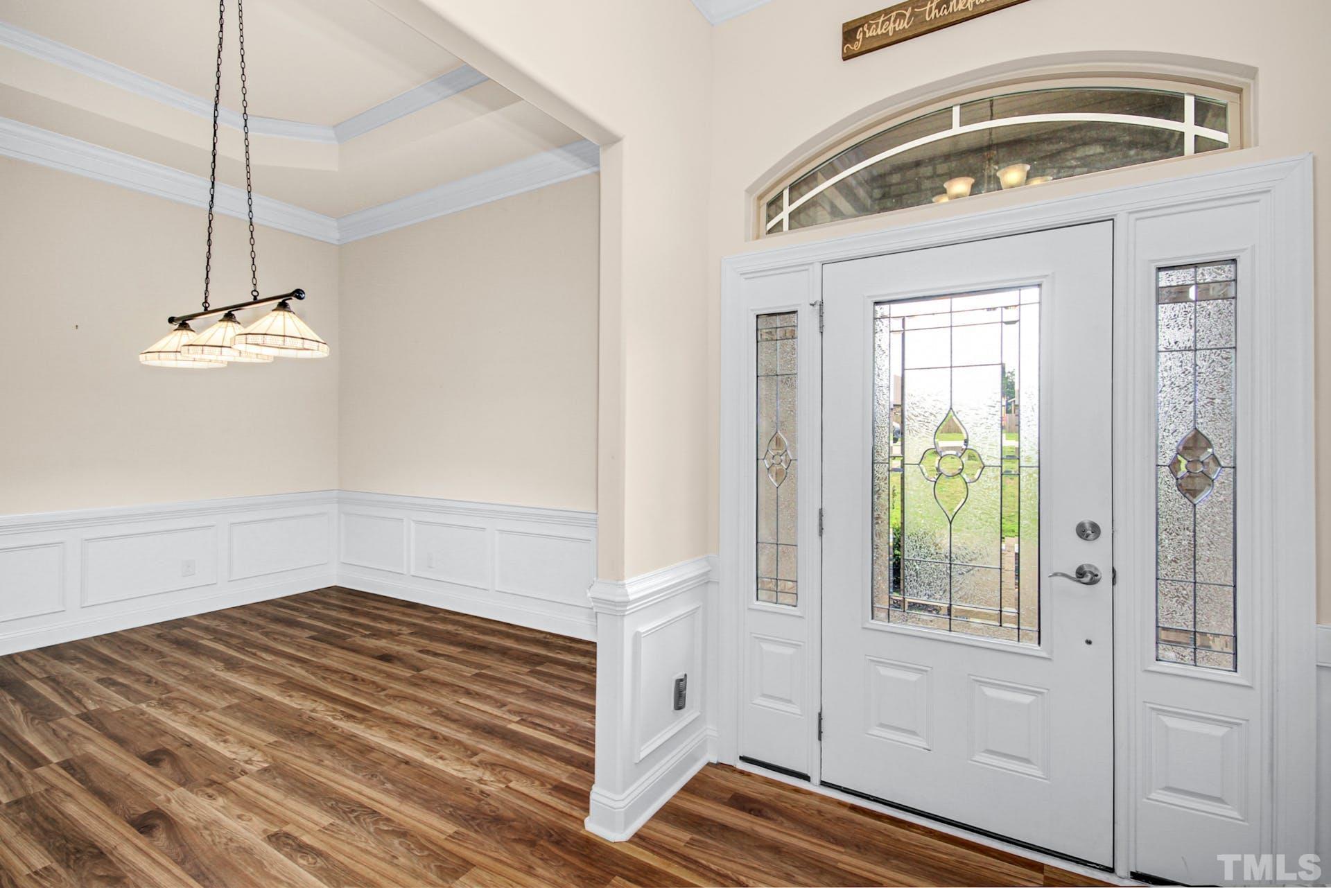 44 Destiny Circle Angier, NC 27501 - Photo 4 of 35 a view of empty room with wooden floor