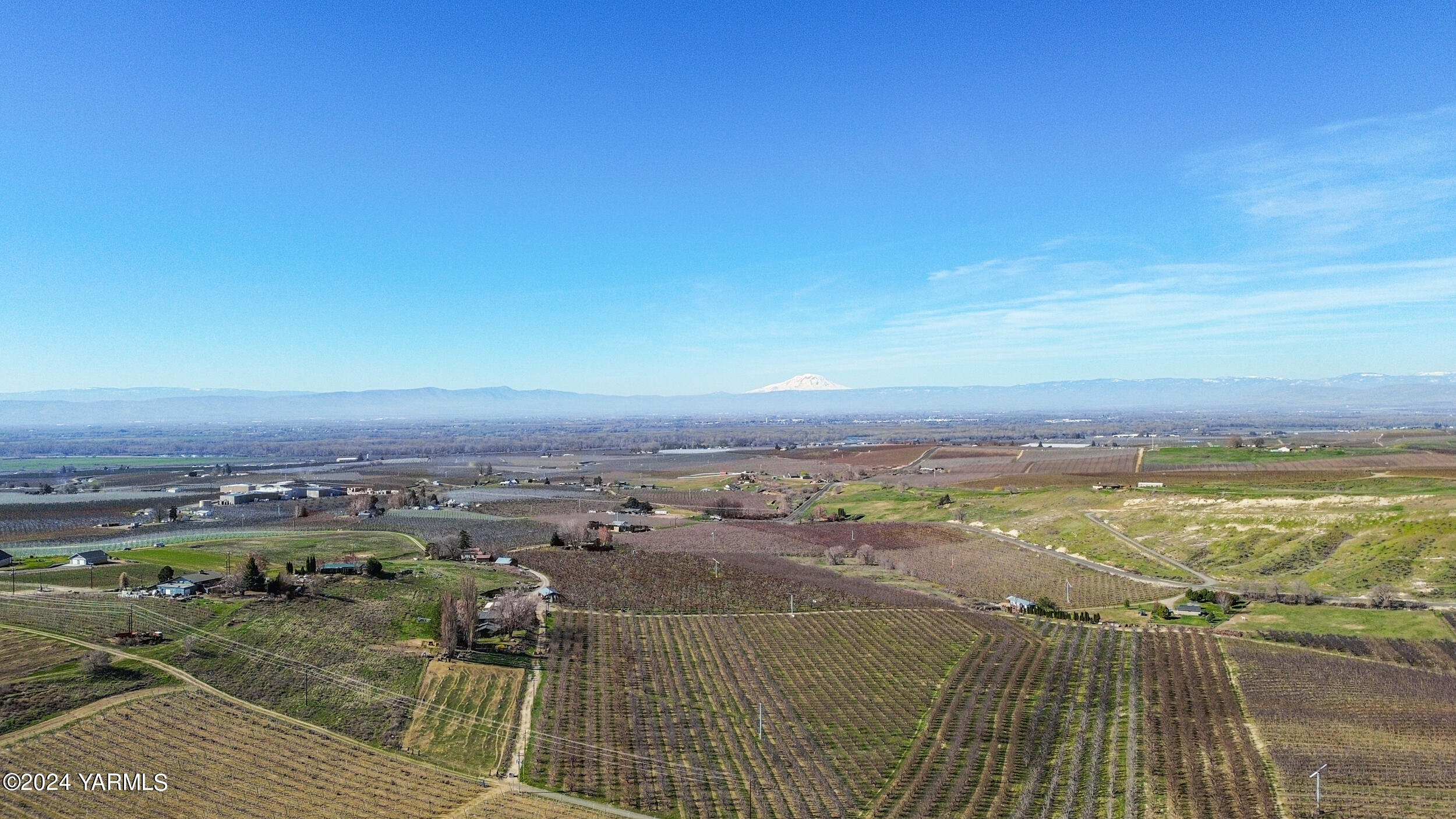 4851 Lombard Loop Road Zillah, WA 98953 - Photo 41 of 42 an aerial view of residential houses with outdoor space