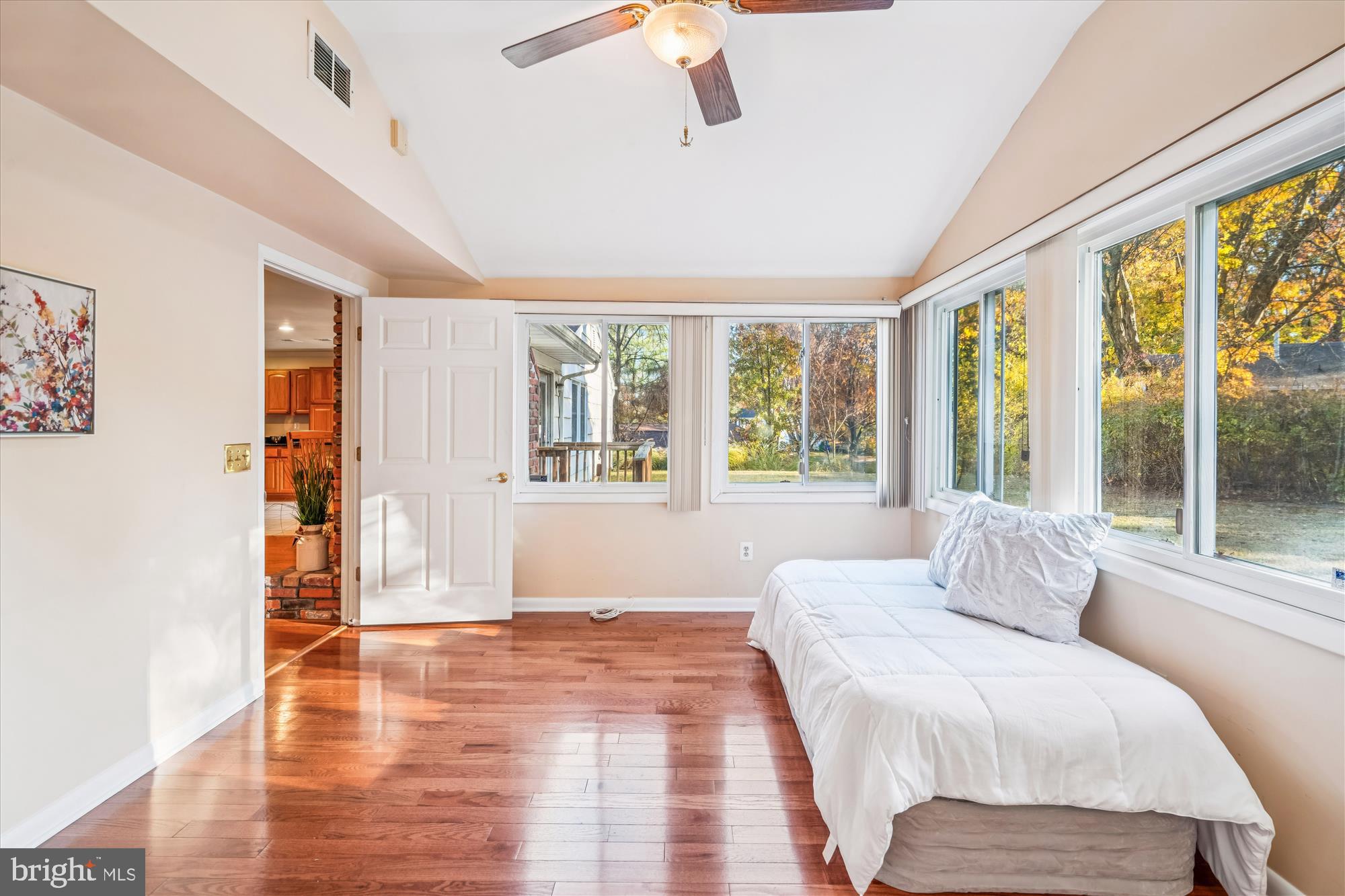 5134 West Running Brook Road Columbia, MD 21044 - Photo 38 of 99 a spacious bedroom with a large bed and a large window