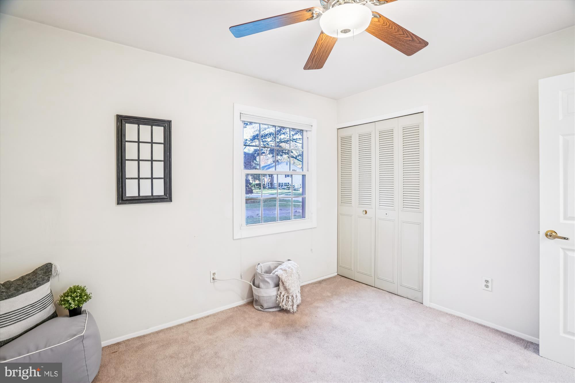 5134 West Running Brook Road Columbia, MD 21044 - Photo 57 of 99 a room with window and a ceiling fan