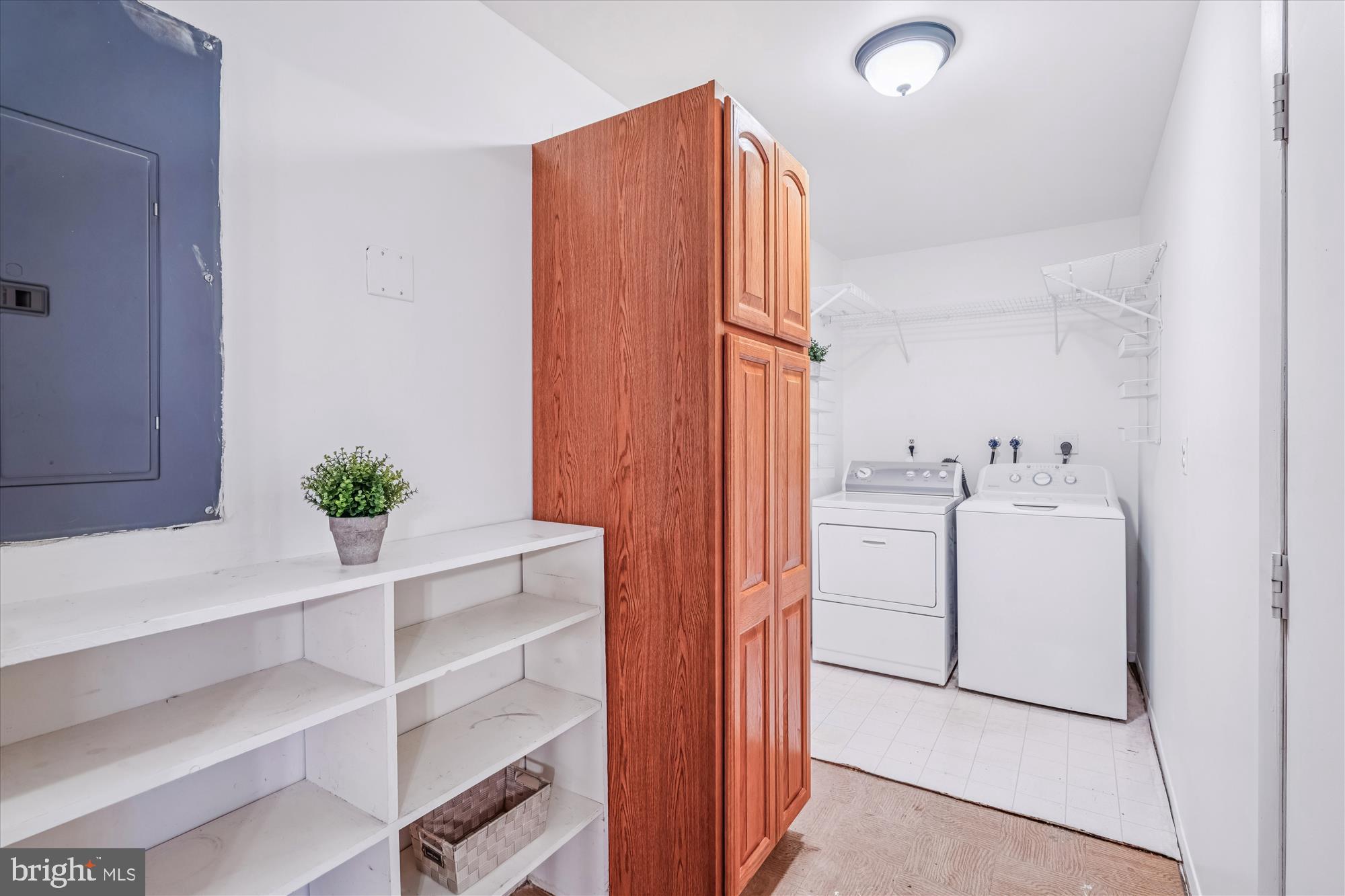 5134 West Running Brook Road Columbia, MD 21044 - Photo 62 of 99 LAUNDRY / MUDROOM W/ WOOD CABINET STORAGE UNIT