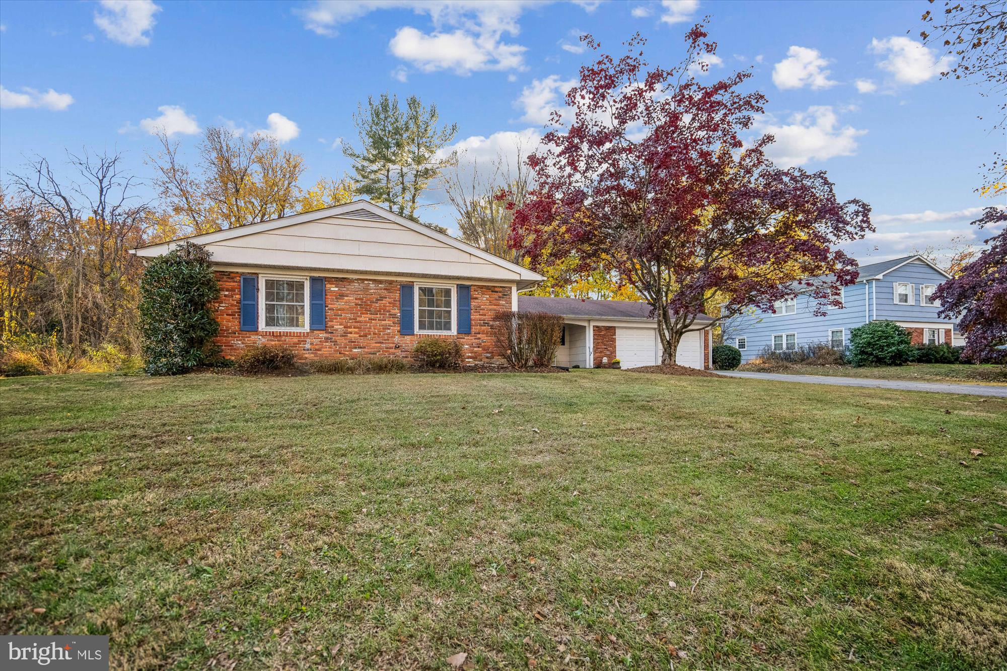 5134 West Running Brook Road Columbia, MD 21044 - Photo 66 of 99 a front view of a house with a garden
