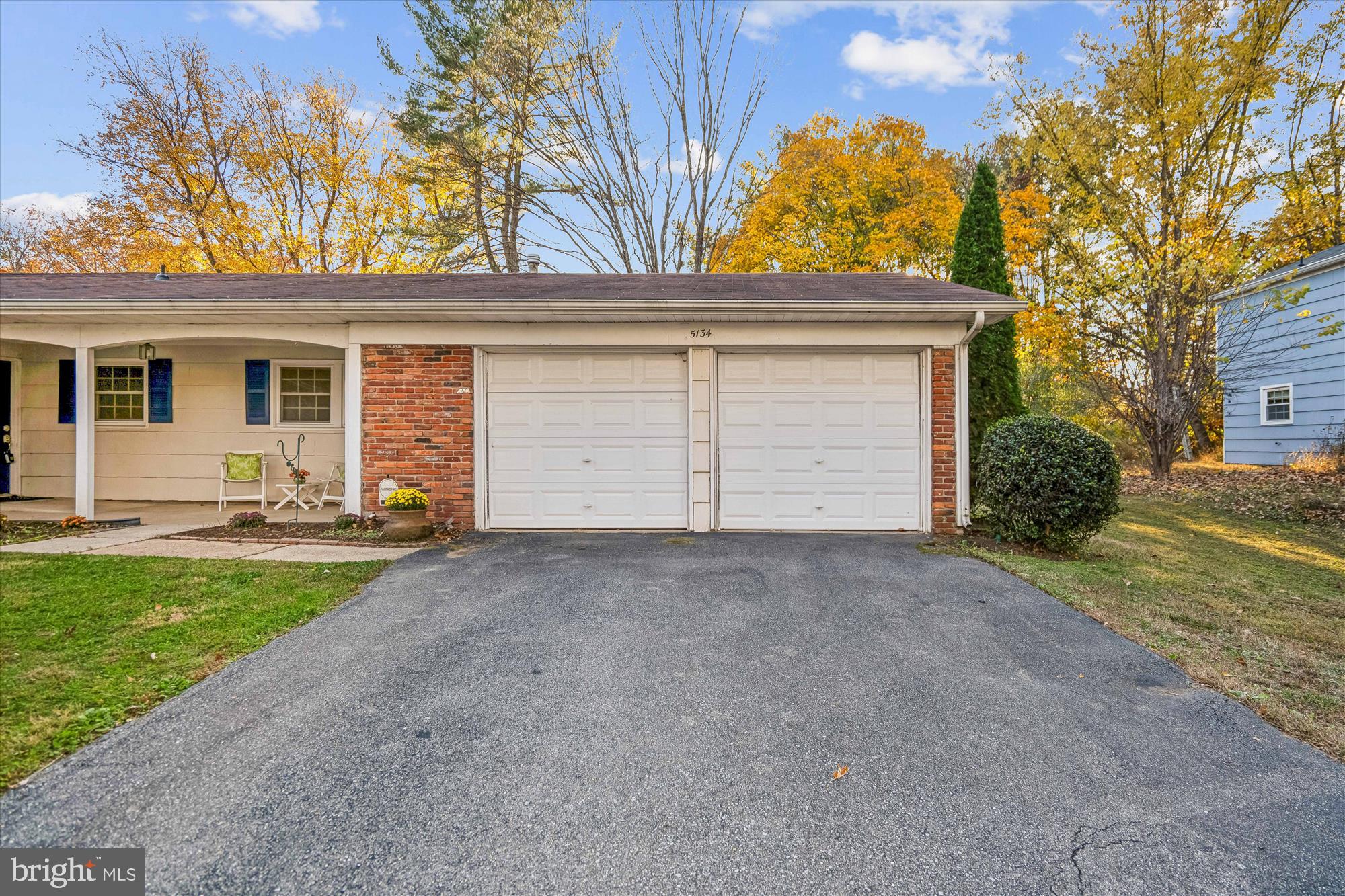 5134 West Running Brook Road Columbia, MD 21044 - Photo 68 of 99 a view of a house with a yard and garage