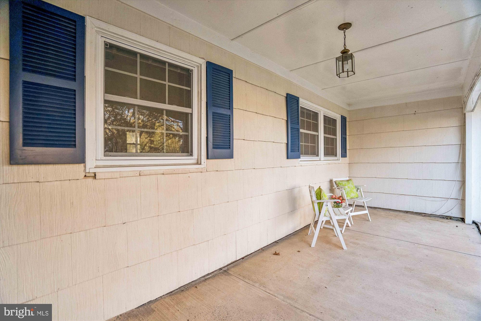 5134 West Running Brook Road Columbia, MD 21044 - Photo 73 of 99 ENJOY A REFRESHING BEVERAGE ON THE COVERED PORCH