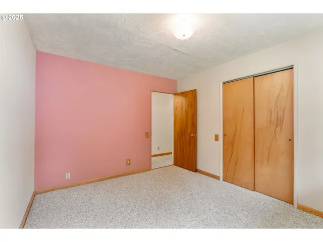 a bathroom with a double vanity sink and mirror