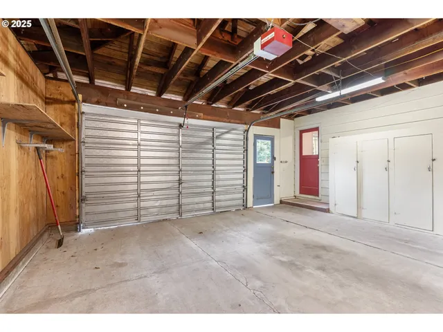 a house view with swimming pool in front of it