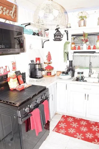 a bedroom with a bed and a mirror