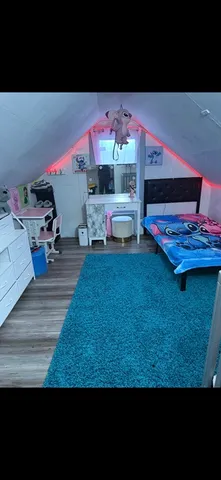 a bathroom with a toilet and a sink