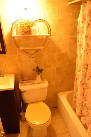 a view of a patio with table and chairs