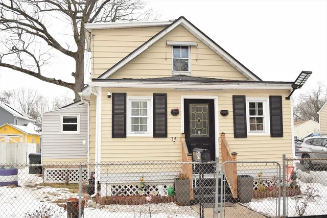 a front view of a house with garage