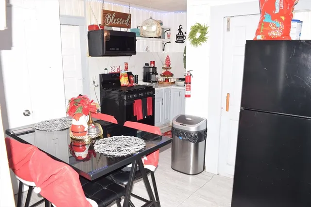 a kitchen with a stove and a sink