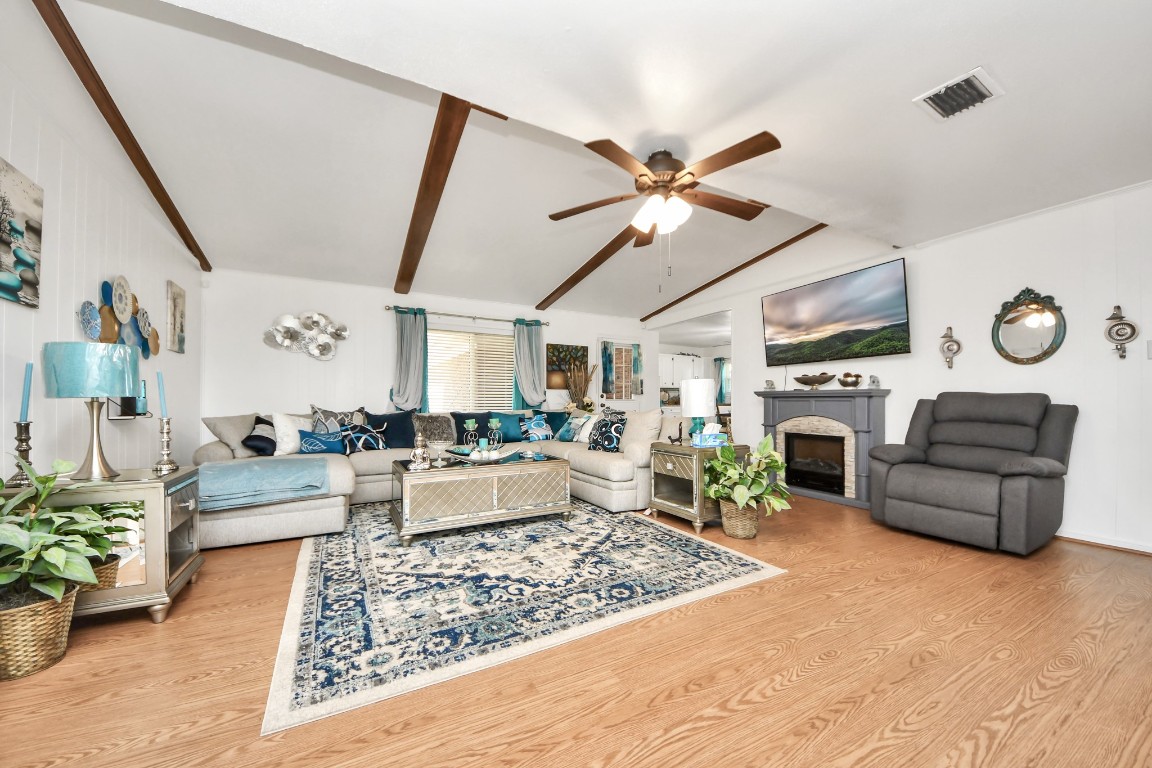 1805 9th Street Hempstead, TX 77445 - Photo 16 of 35 a living room with furniture and a fireplace