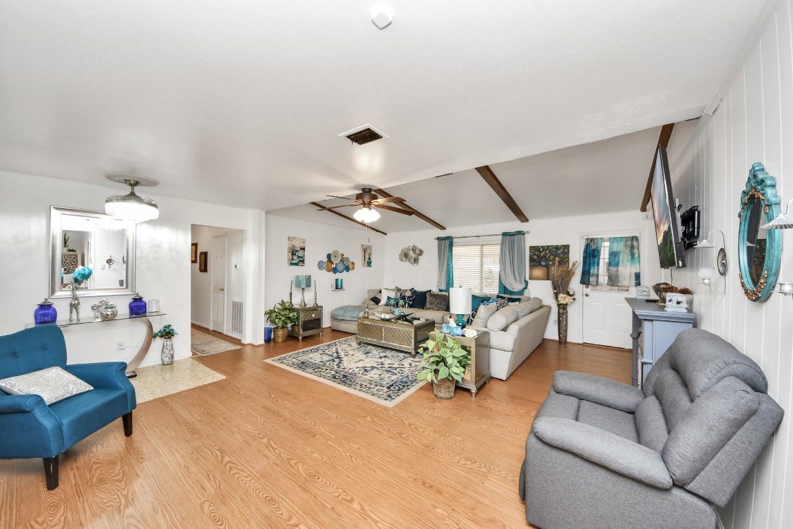 1805 9th Street Hempstead, TX 77445 - Photo 23 of 35 a living room with furniture and wooden floor