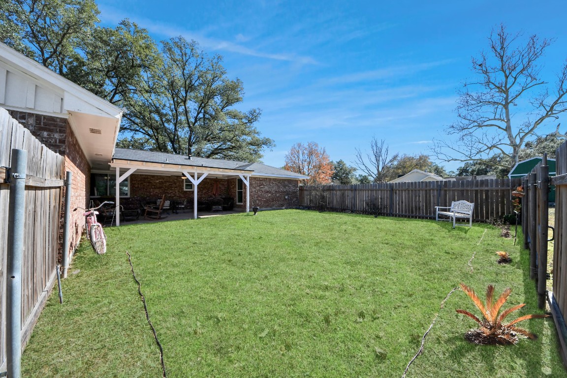 1805 9th Street Hempstead, TX 77445 - Photo 30 of 35 a view of backyard with garden and entertaining space