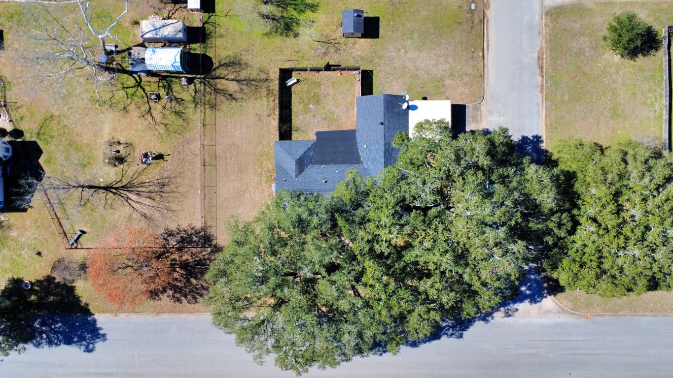 1805 9th Street Hempstead, TX 77445 - Photo 31 of 35 an aerial view of residential houses with outdoor space