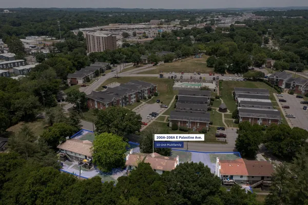 an aerial view of a house with a garden