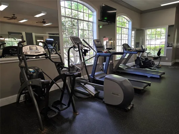 a view of a room with gym equipment