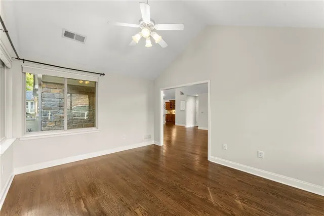 a kitchen with stainless steel appliances granite countertop a stove top oven a sink and dishwasher