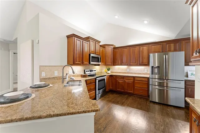 a spacious bathroom with a sink double vanity and a mirror