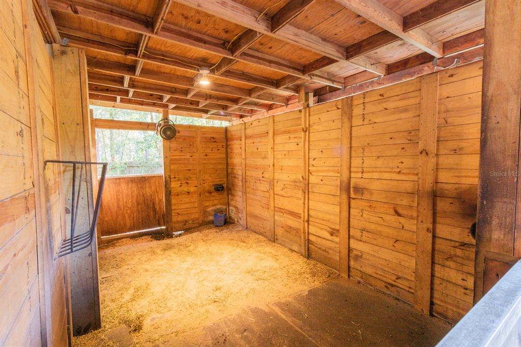 560 North Lake Pleasant Road Apopka, FL 32712 - Photo 41 of 85 a view of a room with wooden walls