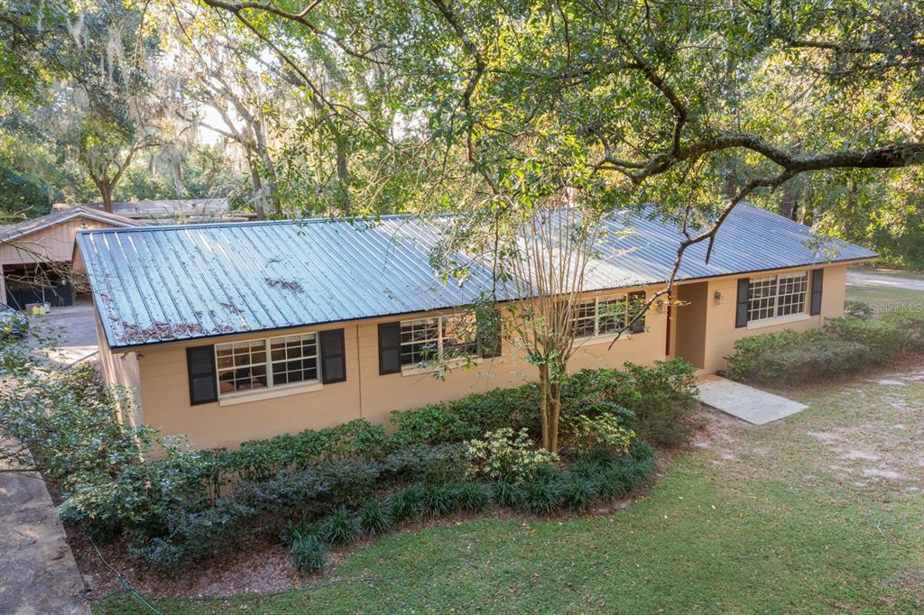 560 North Lake Pleasant Road Apopka, FL 32712 - Photo 64 of 85 front view of a house with a yard