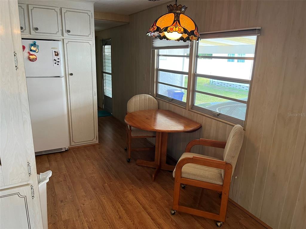 1040 Main Street, Unit 193 Dunedin, FL 34698 - Photo 13 of 16 a view of a workspace with furniture and a window