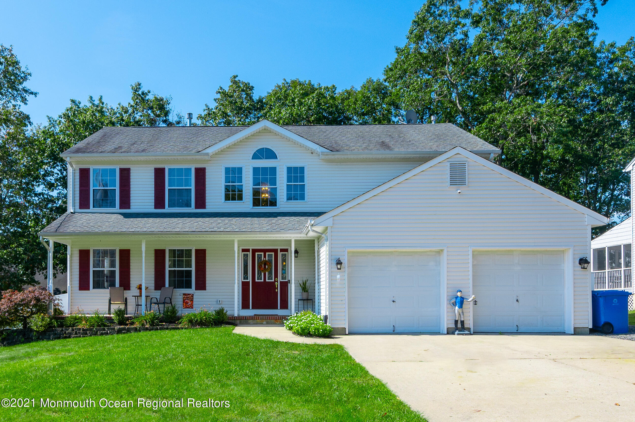 121 Lanyard Road Manahawkin, NJ 08050 - Photo 2 of 39 a front view of a house with a yard