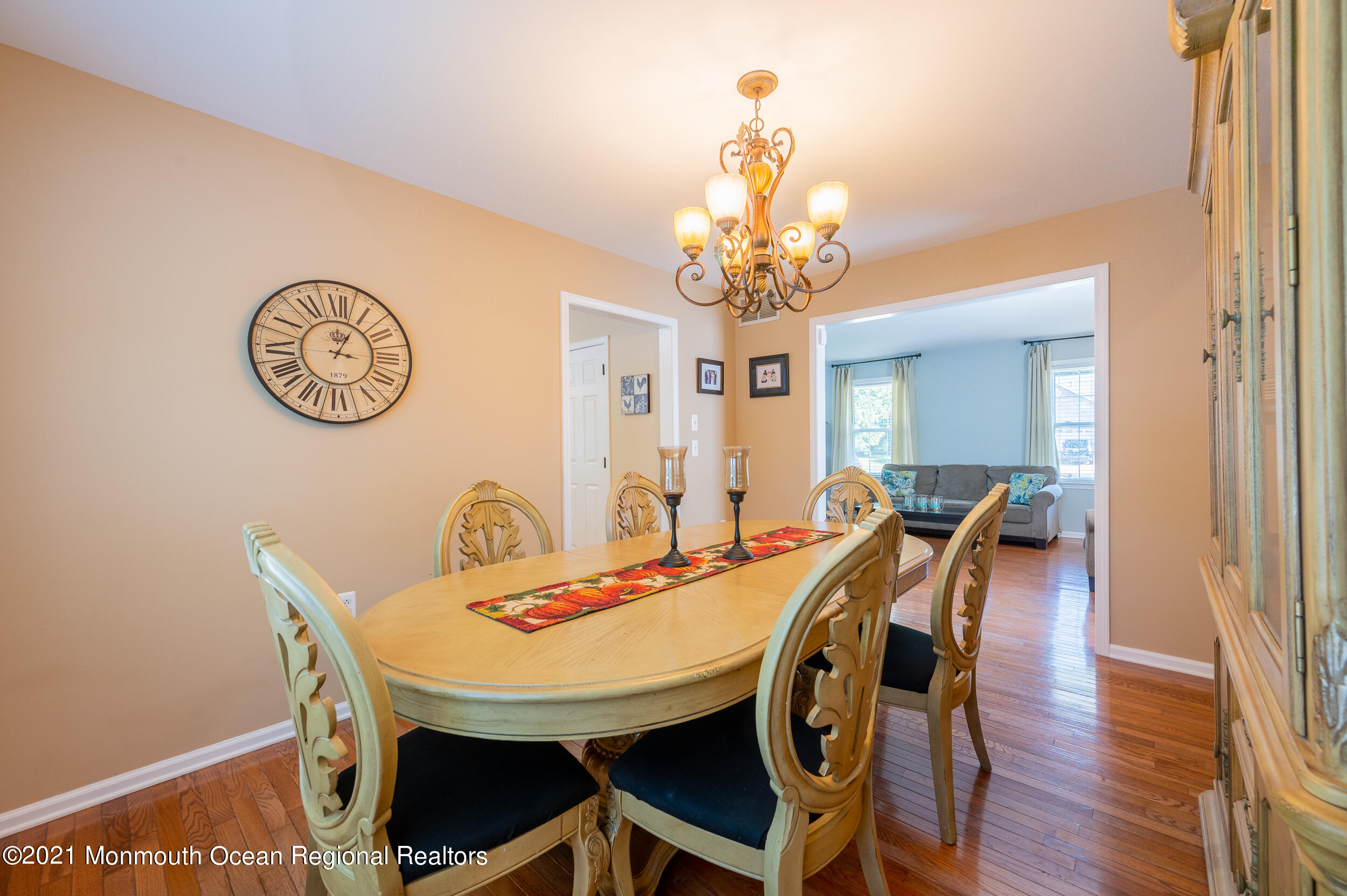 121 Lanyard Road Manahawkin, NJ 08050 - Photo 11 of 39 a view of a dining room with furniture and chandelier