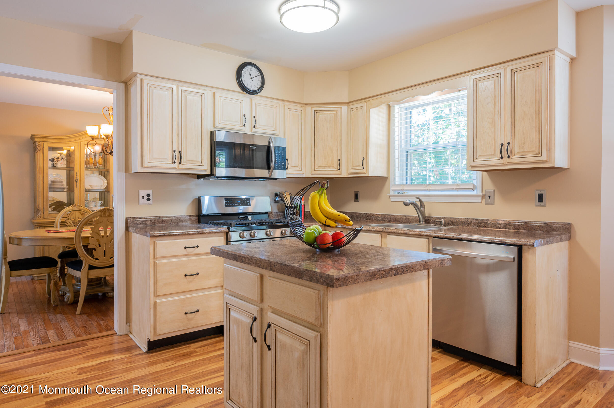 121 Lanyard Road Manahawkin, NJ 08050 - Photo 13 of 39 a kitchen with stainless steel appliances granite countertop a sink window and cabinets